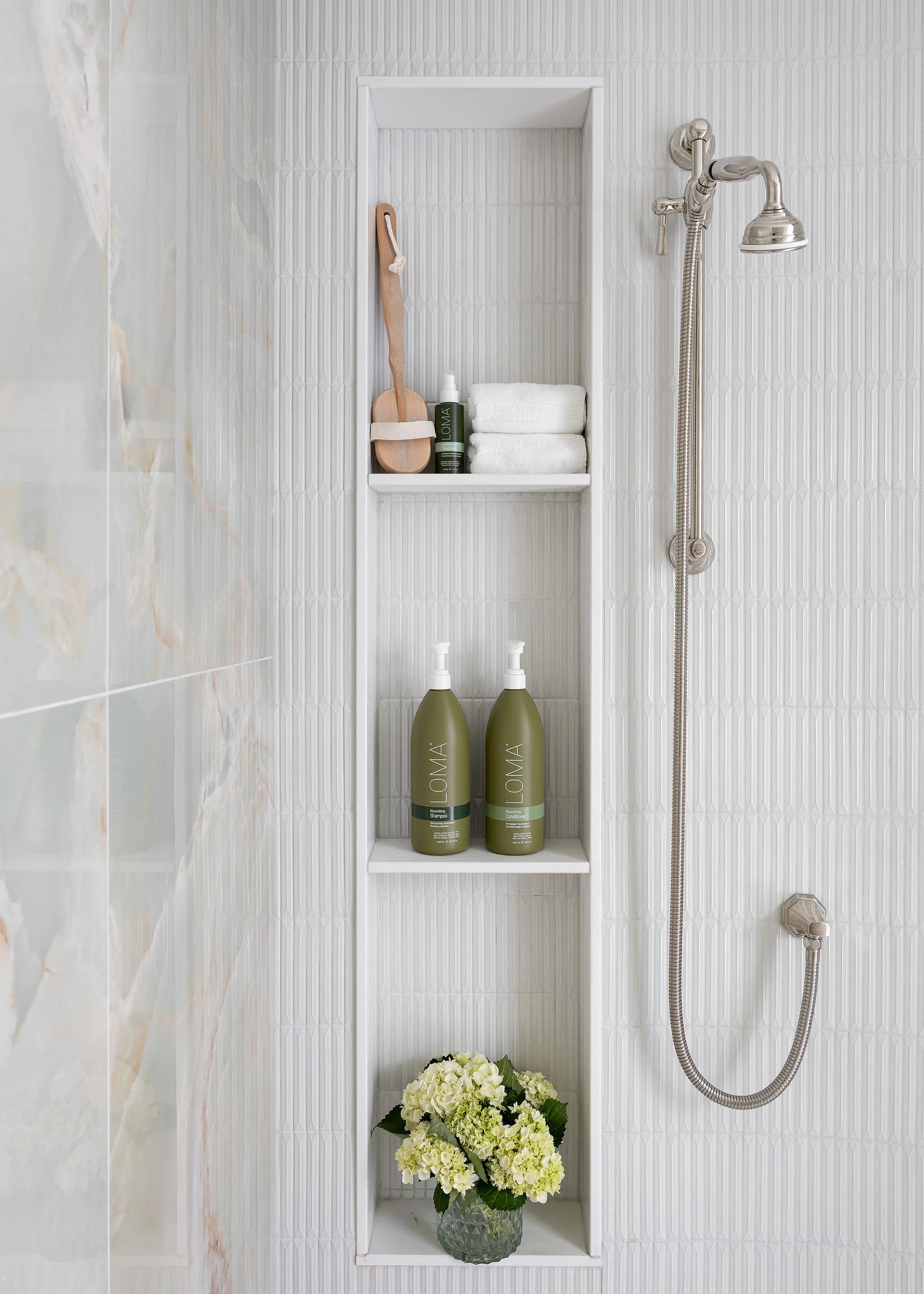 Shower tile and a recessed storage niche