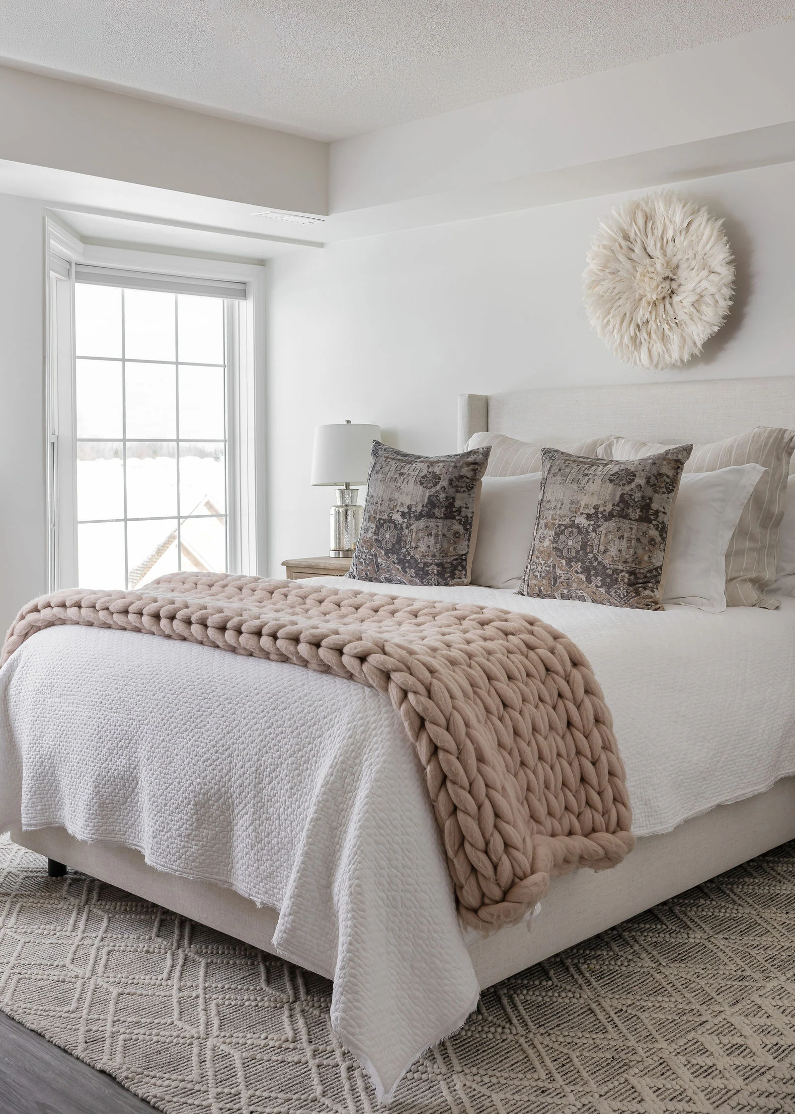 Bedroom with soft neutral finishes